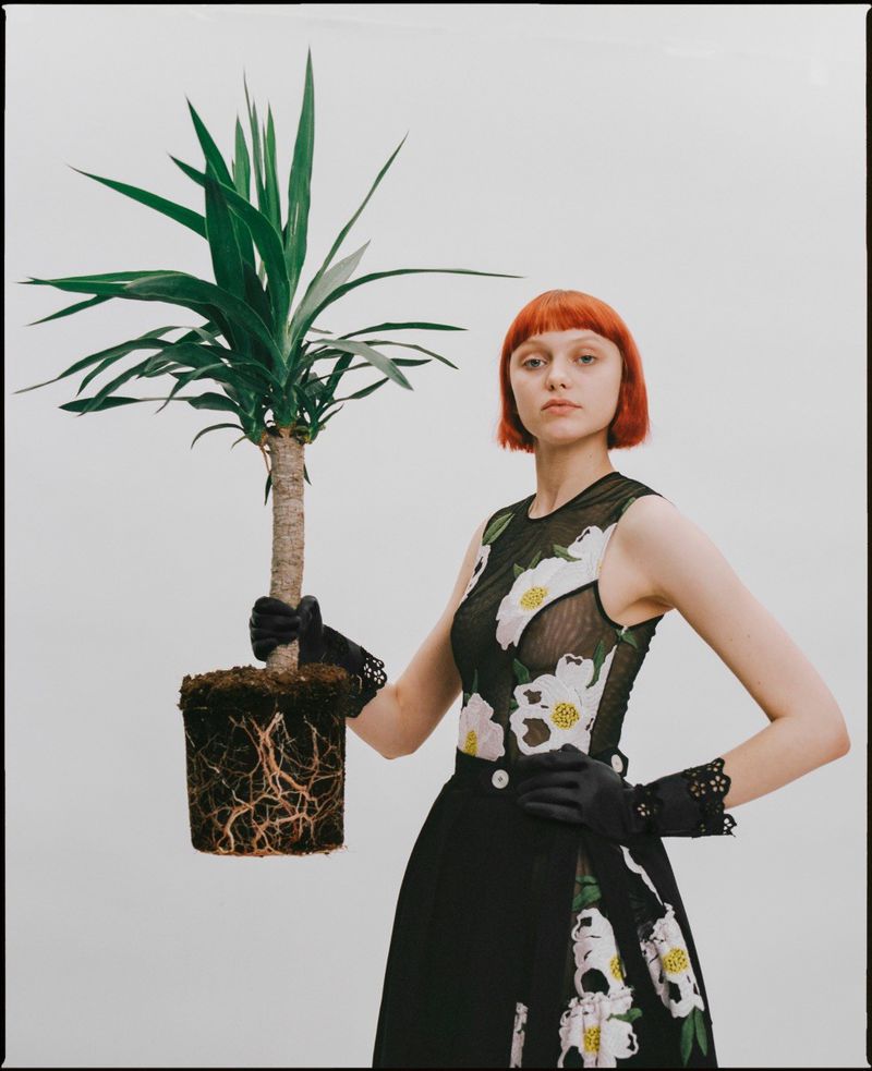 Model poses with plant for Pap Magazine