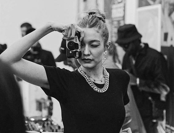 Model Gigi Hadid snaps a photo